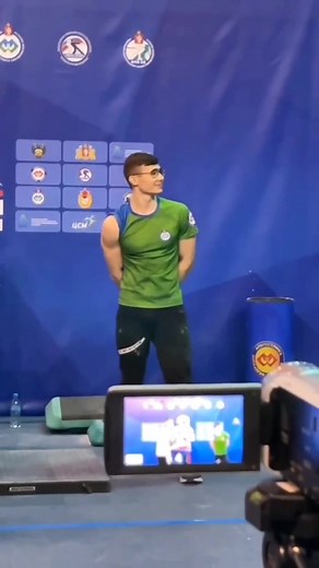 Exciting Arm-Wrestling Match in Indoor Sports Event