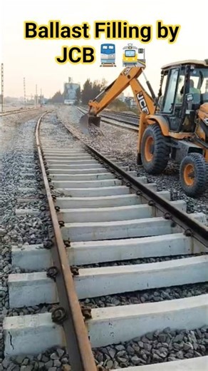 JCB se railway track me Ballast filling ka kaam kiya ja raha hai, taaki formation strong rahe🚉🚆.