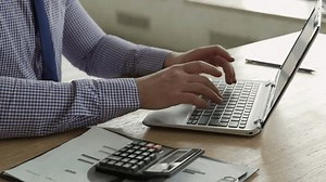senior male hand using calculator on desk calculating expenses, manage personal budget, accounting concept