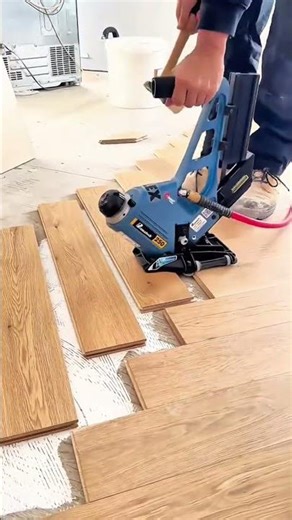 Installing Hardwood Flooring with a Pneumatic Floor Nailer and Rubber Mallet
