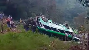 Eight dead and 19 injured in crash after bus plunges 600ft & flips on roof