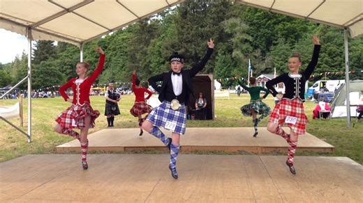 Competitors in the Highland Fling, Scottish Highland dancing heats at the 2024 Drumtochty Highland Games. These were held in the grounds of Drumtochty Castle at Auchenblae in Aberdeenshire, Scotland, on Saturday Saturday 22nd June 2024. Great to see young lads keeping up this traditional dance, one of the most famous Scottish dances performed at competitions throughout the world. It is said to have been inspired by the sight of a stag jumping around a hillside. The dancers movements; the arms he