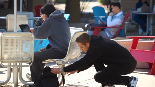 Sneaking $500 into strangers' pockets