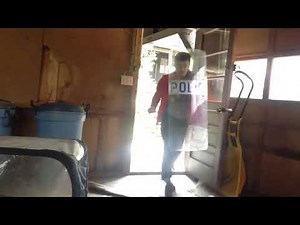 Kid Breaks Window After Kicking Down Door With Riot Shield - 985162