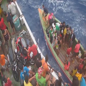 Rescue with the group of people in distress at sea | All Natural