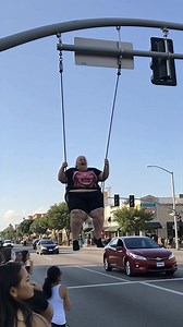 558K views · 332 reactions | This Person Uses Traffic Light As A Swing (AI) | Crafty Panda | Facebook