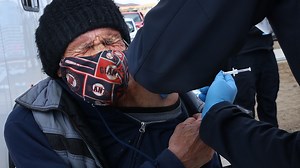 Reno firefighters administer COVID-19 vaccine to Reno's unsheltered population