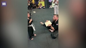 Karate kid finally manages to break a board after class cheers