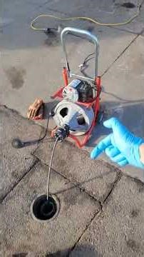 Plumber doing some drain cleaning