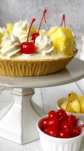 Piña Cola-Duh No bake Cheesecake! Lovers of pineapple, coconut, Piña coladas and cheesecake, this is a must try! Light, refreshing and easy to make! 10 minutes to prep and 3 hrs to freeze. Our friends always love this one. Full recipe below. Ingredients Crust: Ready made Graham cracker pie crust @keebler Filling: * 8 oz cream cheese, softened * ½ cup sugar * 5.4oz can coconut cream * 1 tsp vanilla extract * ¼ cup pineapple juice * 12 oz. cool whip * 2/3 cup crushed pineapple Topping: * 1 pint he