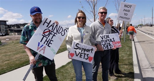 DOGE protest met with counter-protest at Meridian's Tesla dealership Saturday