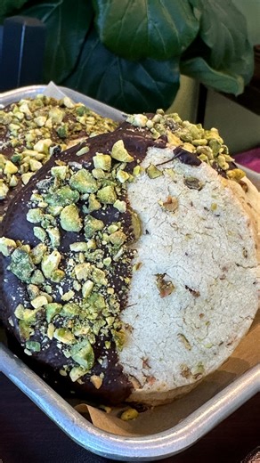 Melt in your mouth chocolate dipped pistachio shortbread cookies! Simply heavenly. Look for them in the case with our other amazing cookies! #shortbreadcookies #pistachio #malvern #malvernpa #sweetzenbakery | Sweet Zen Bakery
