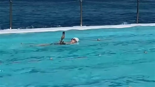 People outraged by woman's unexpected act in pool: ‘The world has gone crazy’