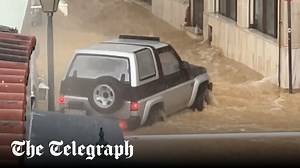 Watch: Holidaymakers stranded as torrential flooding surges through Skiathos