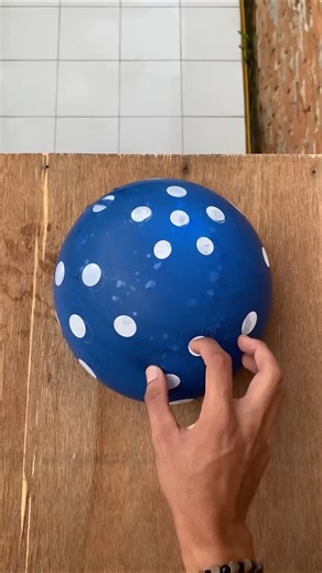 Experiment: Dropping colorful emoji water balloons from a height