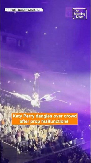 Katy Perry dangles over crowd after prop malfunctions