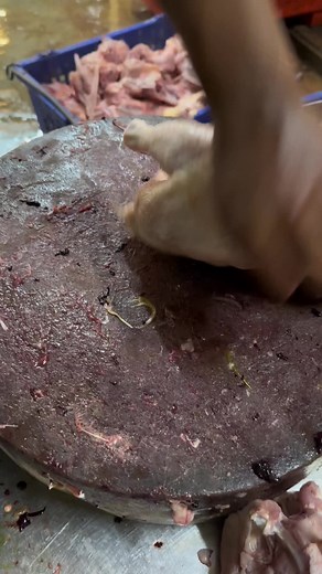 Raw Chicken Butchering Techniques in a Wet Market