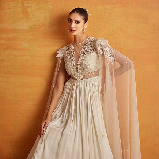 Sunshine Sparkle🌟 Experience sunshine glamour in this breathtaking gown with mesmerizing design and eye-catching sleeves✨ Get your fashion fix – visit our store now💫 #neerusindia #neerus #neerusfashion #newcollection #ethnicwear #lehengas #bridal #gowns #sarees #fusion | Neerus India
