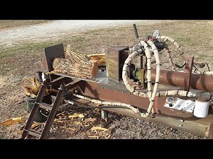 Splitting wood with my homemade log splitter