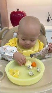 The baby is immersed in eating, focusing entirely. #feedingintolerance