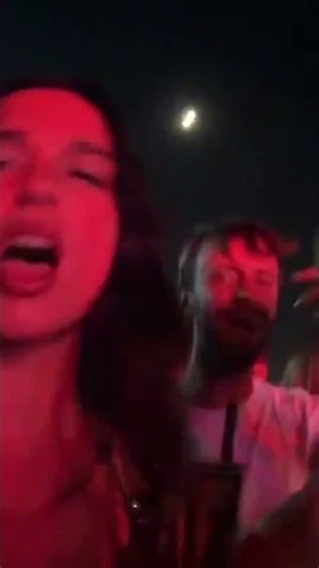 Dua Lipa singing "Hot N Cold" during the "Sunny Hill Festival" in Kosovo.