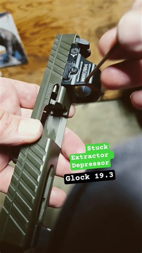 I need help getting this extractor depressor out of a g19 slide. ideas? #glock19gen3