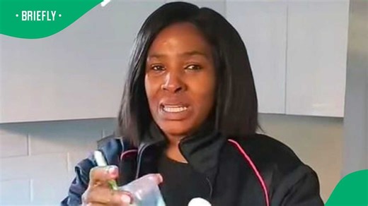 Housekeeper removes lint on clothes with R5 solution, SA impressed