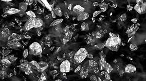 Metallic silver or chrome rock bursting explosion with a bullet time effect in a 3d animation.