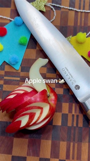 Apple swan a pretty garnish for the holidays #apple #appleswan #LifeOnTikTok #TikTokPartner #nakanoknives