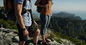 Man, woman and hiking on mountain top for view outdoor adventure climbing, gear for exercise. Couple, explore rock and together for athlete connection or trekking in summer, ocean horizon or fitness