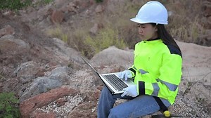 clip-3839523029-geologist-surveying-mineexplorers-collect-soil-samples-look