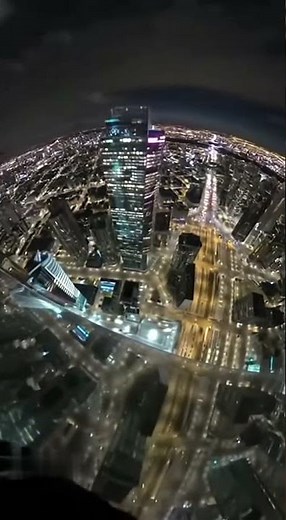Experience the Ultimate Rush Night BASE Jump Over a Sparkling Metropolis