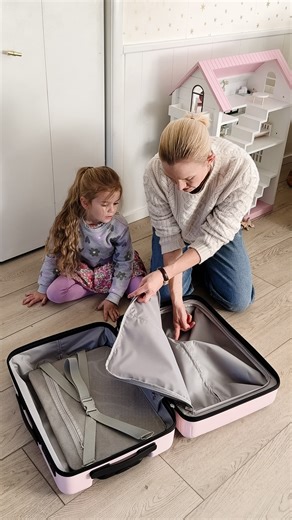 Anne Sage | Interiors + Style on Instagram: "Wait til you see what she packs! 🥹 Comment LUGGAGE for the link to our @baggallini suitcases + these GENIUS packing cubes! Halo has been begging me for a “real” suitcase all her own—she’s tired of sharing a duffel with her baby sister—and this pink carry-on is perfect. (So perfect, in fact, that I’ve got one for myself in black!) We had so much fun together packing for a trip to see The Nutcracker in LA. The huge compartments hold so much, especially
