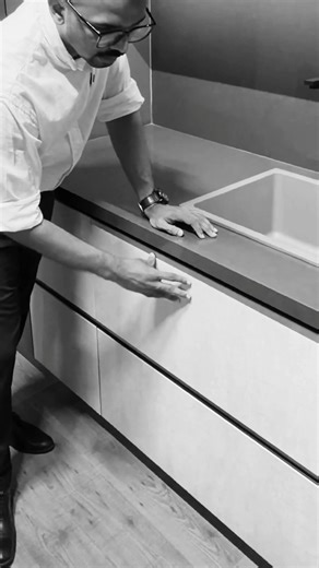 Smart Sink Drawer Storage for modern kitchens ✨ No more wasted space under the sink! Most kitchens waste the space under the sink because of plumbing. But this U-shape sink drawer makes it possible to store dishwashing liquids, scrubbers and cleaning items neatly. A smart modular kitchen storage idea for modern homes. #RoomyFurniture #KitchenIdeas #ModularKitchen #KitchenStorage #SinkDrawer