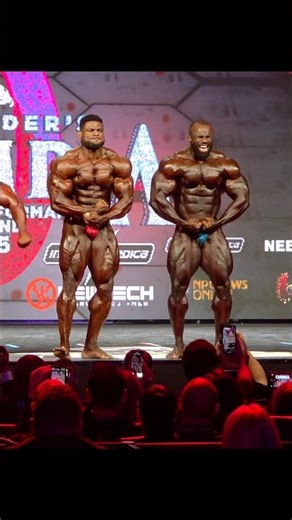 two taller bodybuilders, Andrew Jacked and Samson Dauda at Mr.Olympia