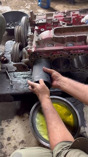 Truck engine sleeve ￼ install #engine #engineblock #mechanic #shorts