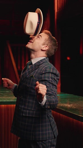 The Gentleman has entered the room. 🥂 Oscar Kaufmann, a circus performer from Berlin, brings his gravity-defying artistry to The Green Light! Transforming the ordinary into the extraordinary, he turns a simple hat stand into a magical aerial spectacle. This act needs to be seen to be believed. ✨ See Oscar in 'GATSBY at The Green Light' before it closes on 28 March. | Sydney Opera House