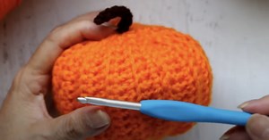 How To Crochet A Pumpkin With This Easy Fall Decor Tutorial!