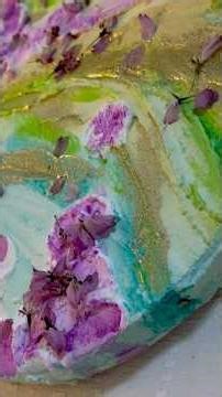 A video showing the creation of a cherry blossom landscape using texture art finished with baking...