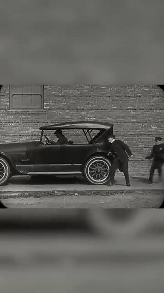 Buster Keaton Clings to a Moving Car in Wild Police Chase | The Goat (1921)