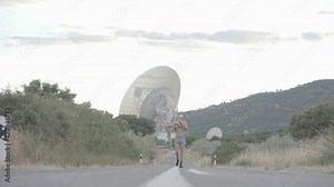 Man with gas mask running down a road without a shirt