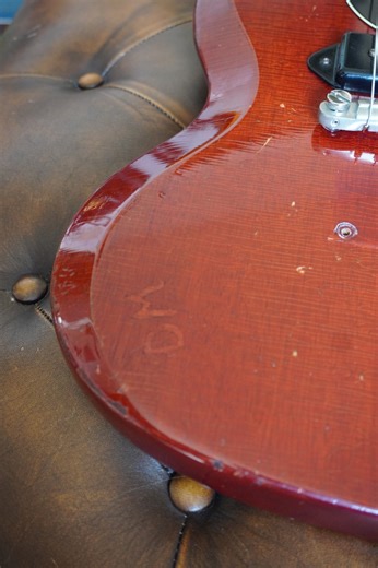 Every vintage guitar carries a story… This 1964 Gibson SG Jr. came with a mystery — the initials “D.M.” carved right into the body  Watch our FIRST full video over on YouTube: https://www.youtube.com/watch?v=a7oxiERMcxA Vintage | Unique | Hand-Picked Guitars St. Louis, MO — nickshandpicked.com | Nick’s Hand Picked Guitars | Facebook