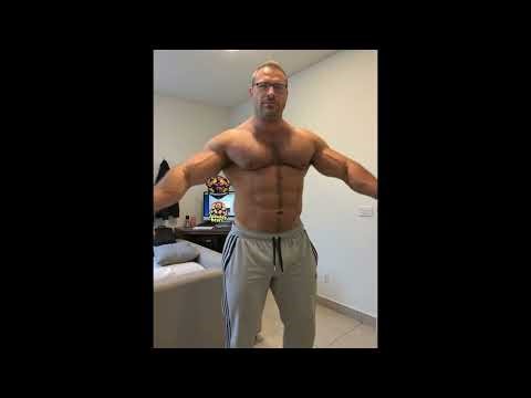 Bodybuilder Flexing at Home