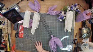 Have y'all seen a polyburlap cross design before? If not, Coach Mel is showing y'all how to complete this pretty design, and it's perfect for spring and Easter. Let us know if you're going to try this look or if you already have! | DecoExchange