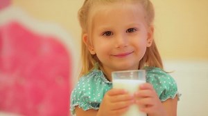 Adorable Little Girl Drinking Milk Stock Footage Video (100% Royalty-free) 10917218 | Shutterstock