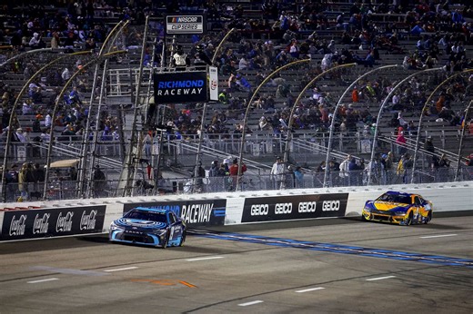 WATCH: NASCAR fan climbs on top of the fence during the Cup Series race at Richmond Raceway