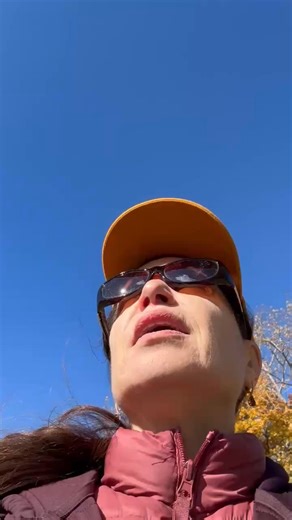 Blue skies, rolling waves, orange colored leaves on trees. It’s a beautiful day! | Alana Cahoon