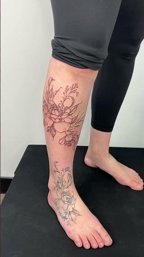 Floral leg tattoo