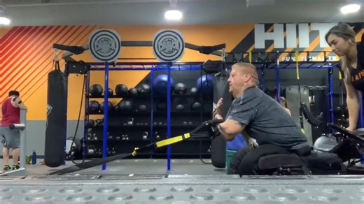 Why is my trainer dragging me backward? Watch the sled. To the untrained eye, this looks chaotic. But this is what 260lbs of resistance looks like when you’re training to pull a literal truck. Since I can't use my legs to drive the sled, we improvised. My trainer resets the distance, and I use pure upper body torque to haul that 260lb sled back to me. We aren't just moving weight. We are building the engine to move mountains (and line trucks). #sledpull #adaptivestrongman #truckpullprep #upperbo