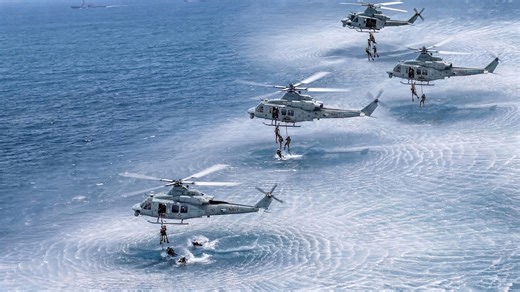 US Marine helicopters performing extreme special forces insertions